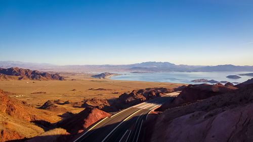 Panoramic view of landscape against clear blue sky