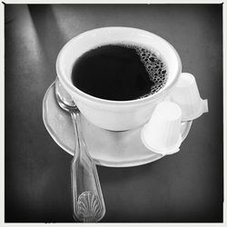 Close-up of coffee cup on table