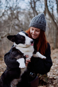 Portrait of woman with dog