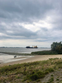 Scenic view of beach against sky