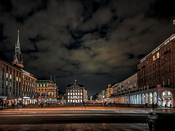 Illuminated city buildings at night