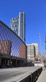 Low angle view of skyscraper against clear sky