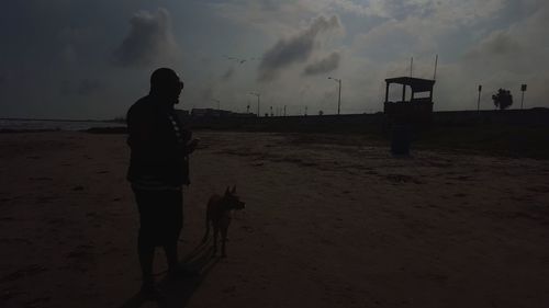 Woman standing on beach