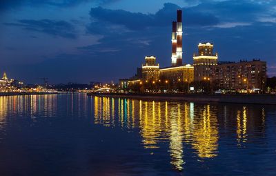Illuminated city at waterfront