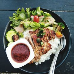 Directly above food served in bowl on table