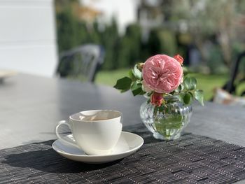 Flower vase on table