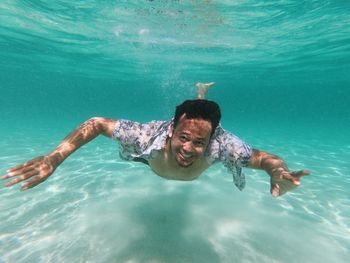 Man swimming in sea