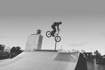 Rear view of man walking on street