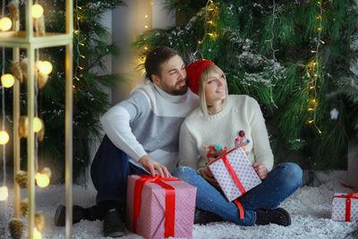Portrait of young woman using mobile phone