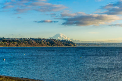 A view of mount rainier across the puget sound. photo taken in burien, washington.