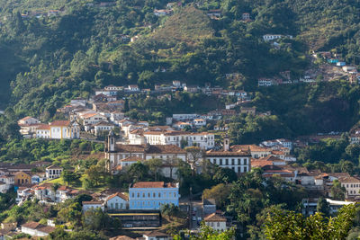 High angle view of townscape and trees