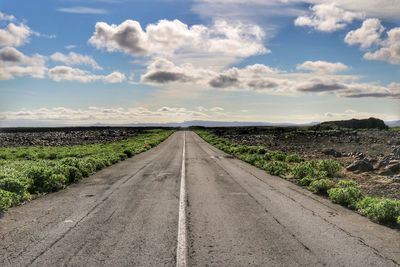 Road passing through field