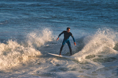 Man surfing in sea