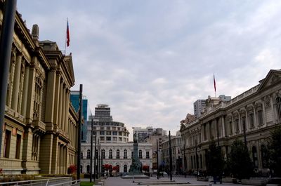 Buildings in city against sky