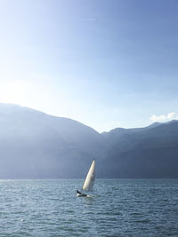 Scenic view of sea against blue sky