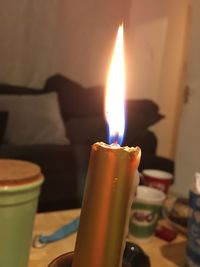 Close-up of illuminated tea light candles