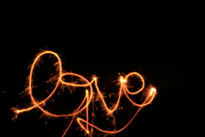 Light painting against sky at night