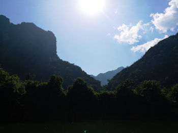 Scenic view of silhouette mountains against sky