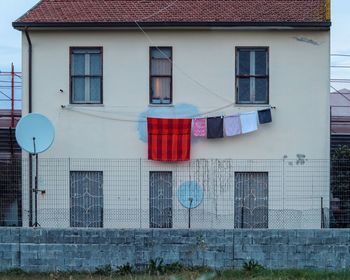 Clothes drying outside building