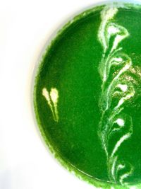 Close-up of drink against white background