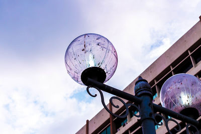 Low angle view of metal structure against sky