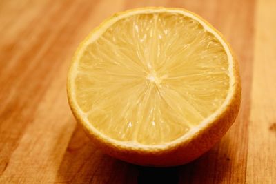 Close-up of orange slice on table