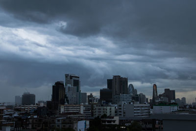 Modern buildings in city against sky