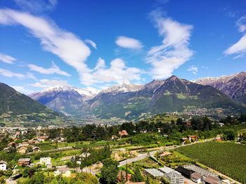 Scenic view of landscape and mountains against sky