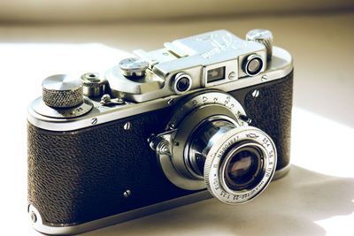 Close-up of camera on table