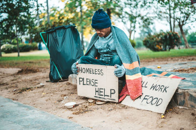 Man with text on the ground