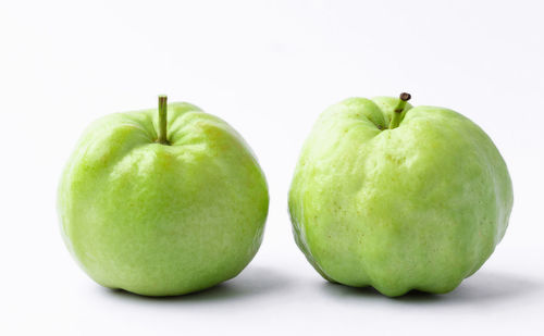 Close-up of apple against white background