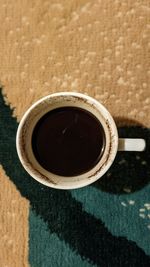 High angle view of coffee cup on table