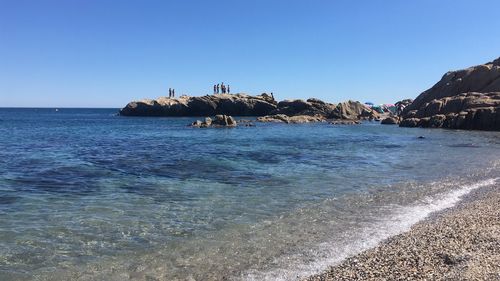 Scenic view of sea against clear sky