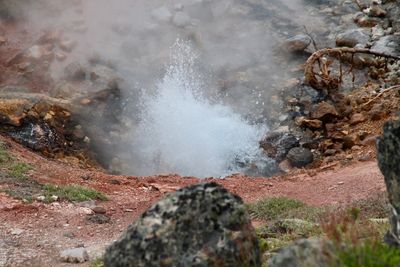 Close-up of water flowing through rocks