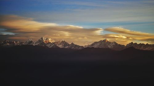 Scenic view of mountains against sky during sunset