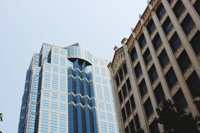 Low angle view of skyscraper against clear sky