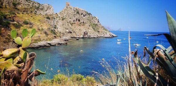 Scenic view of sea against clear sky