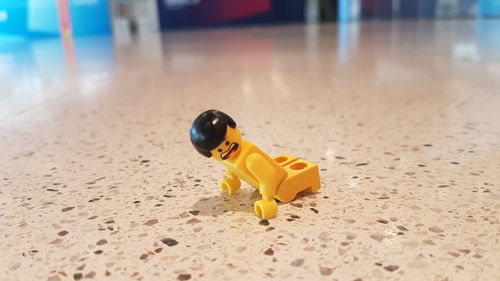 Close-up of toy car on sand