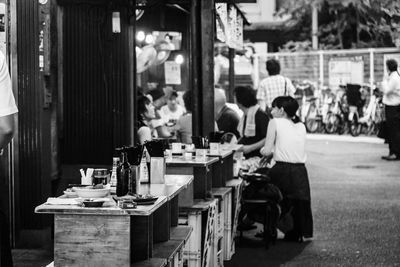 Rear view of people sitting in restaurant