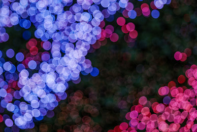 Defocused image of illuminated christmas lights