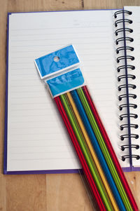 High angle view of multi colored pencils on table