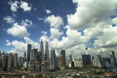 Modern buildings against sky in city