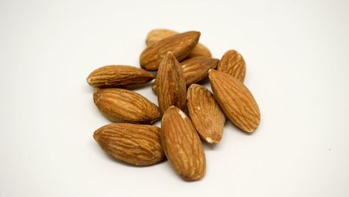 Close-up of bread against white background