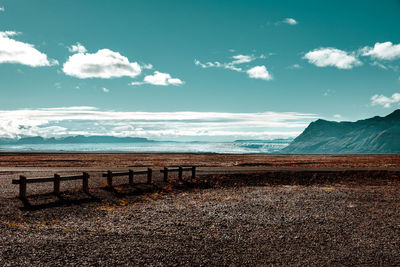 Landscape and mountains against sky