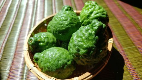 High angle view of vegetables in basket on table