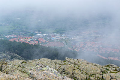 Rocky mountains on a foggy day at el escorial mountain in madrid in spain. horizontal photography