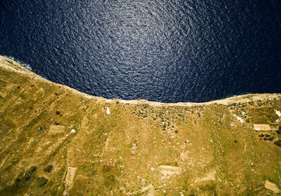 Aerial view of cliff by sea at dingli