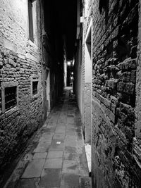 Walkway amidst buildings