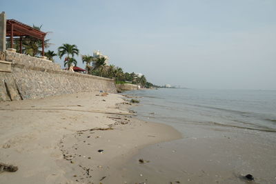 Scenic view of beach against clear sky