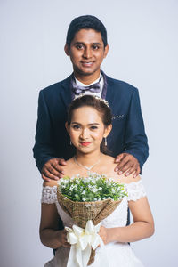 Portrait of a smiling young couple